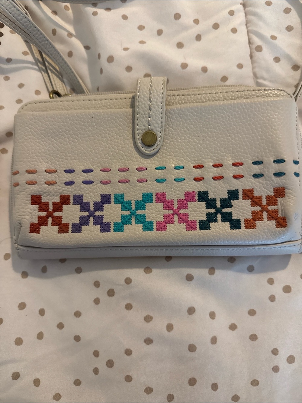The Sak White Wristlet with Multicolor Cross-Stitch Detail